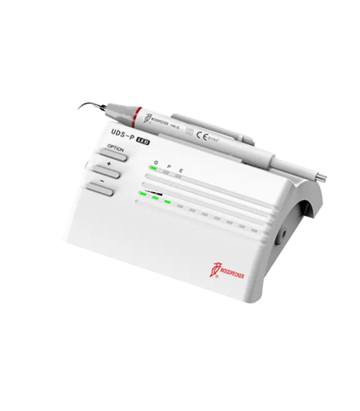 Dental ultrasonic device (Woodpecker UDS-P) with two handpieces attached, used for dental scaling and cleaning in a clinic.
